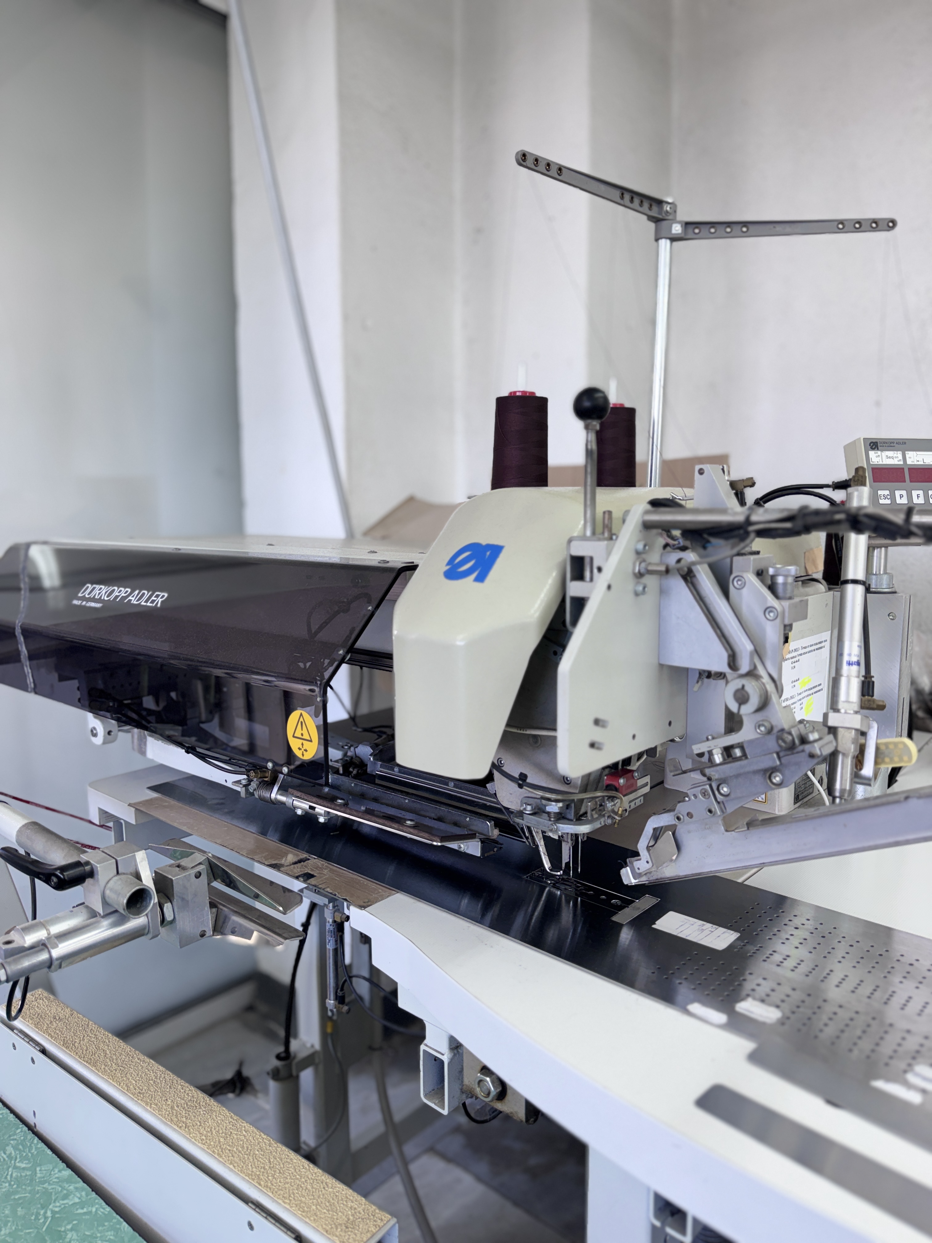 Dürkopp Adler 745-34 automatic pocket-welting machine at DIMTEX